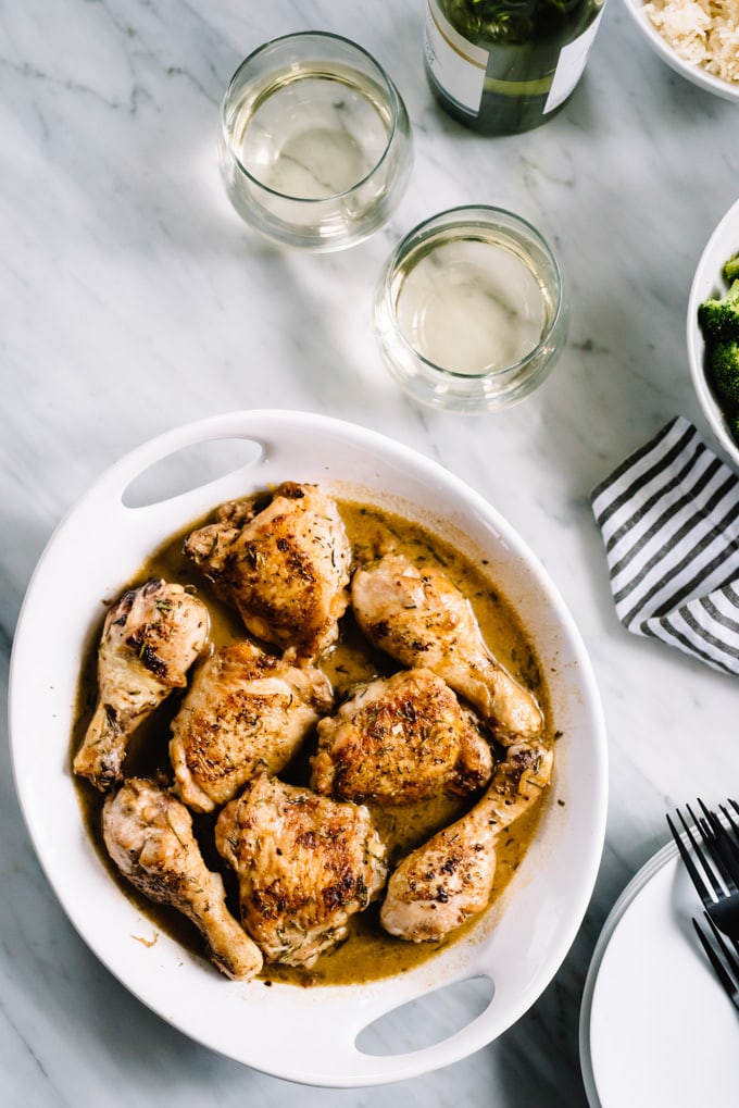 This creamy rosemary garlic chicken recipe is an easy and flavor packed weeknight dinner! It's ready in just thirty minutes and completely kid friendly. #30minutesorless #rosemarychicken #kidfriendly #weeknight #recipe #chicken