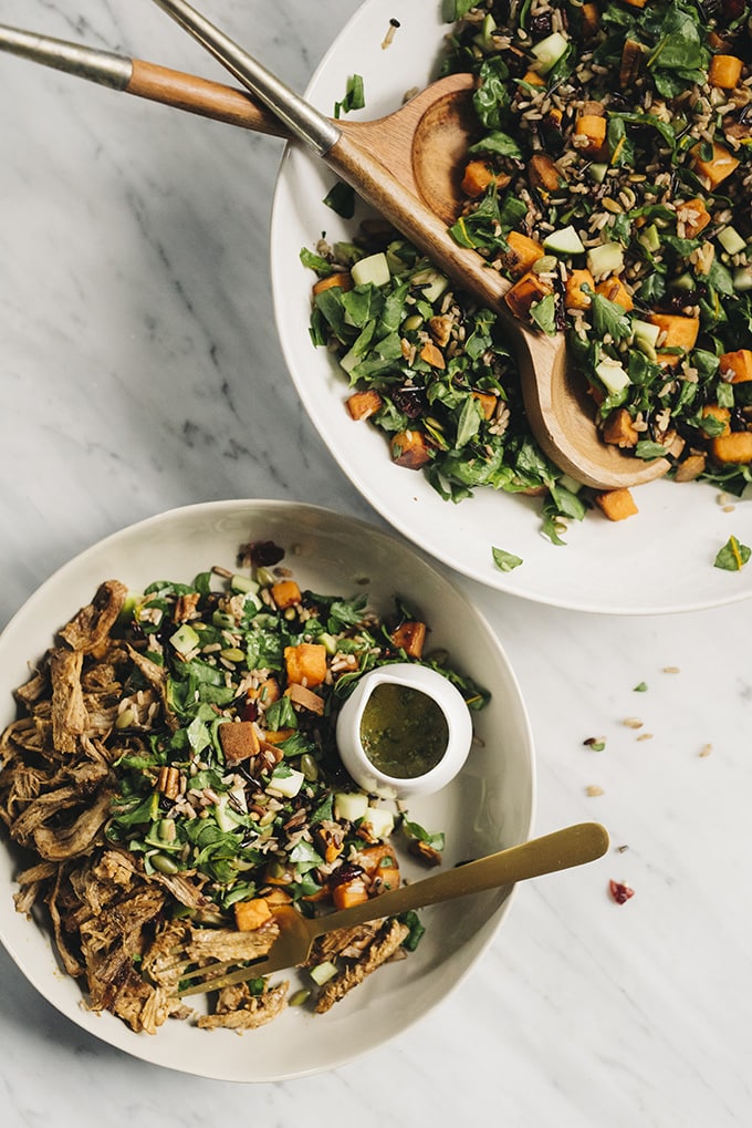 This roasted sweet potato salad with maple vinaigrette is bursting with fall harvest flavor! Roasted sweet potatoes, crisp apples, tender swiss chard, and nutty wild rice come together for a hearty, nutritious, and flavor-packed vegetarian dinner. 