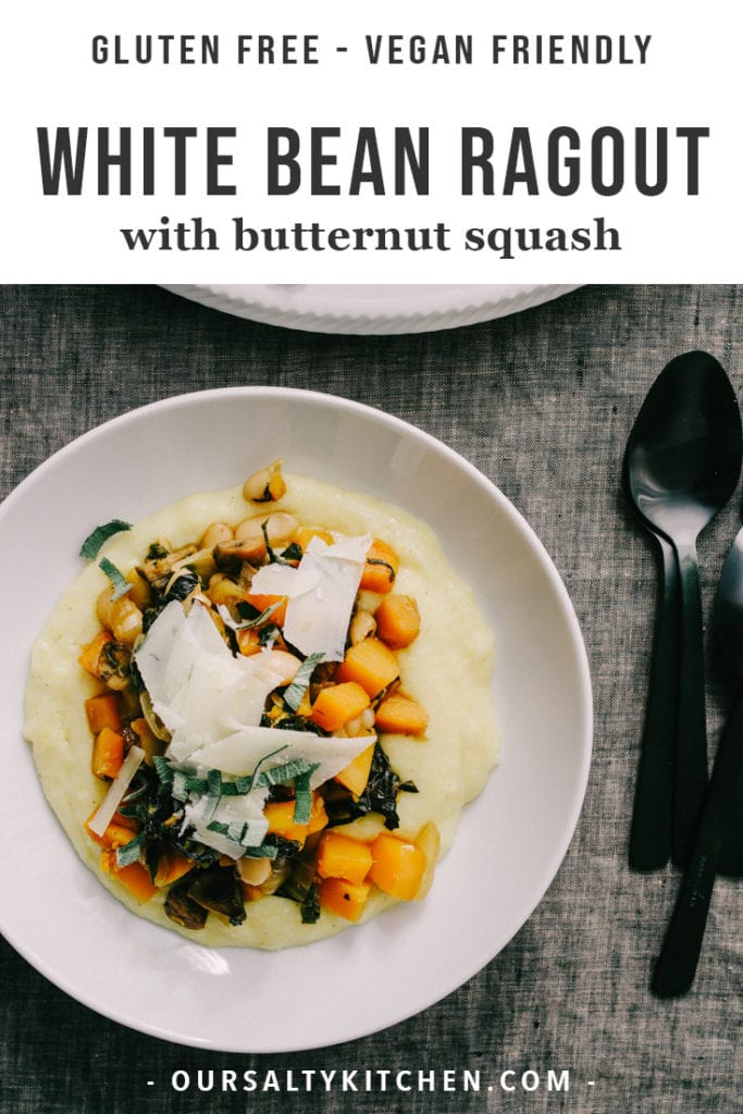 A bowl of white bean ragout with butternut squash over polenta, garnished with parmesan and fresh sage.