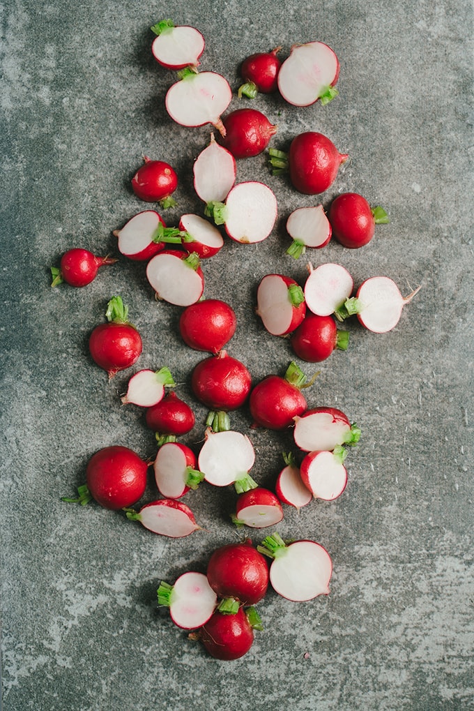 Roasted radishes are sweet, tender and juicy. While perfect on their own with a little butter and salt, they really shine in a warm grain salad tossed with mint salsa verde.