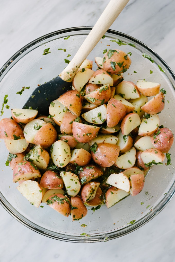 Perfect boiled potatoes tossed with basil dressing for no mayo potato salad.