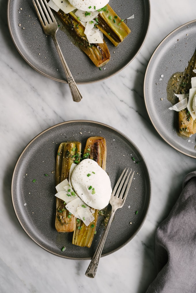 Braised leeks are incredibly simple and deceptively tasty. While perfect as a side dish, I like to turn them into a simple and nutritious whole food dinner by adding a poached egg. #wholefood #realfood #glutenfree #leeks #poachedegg