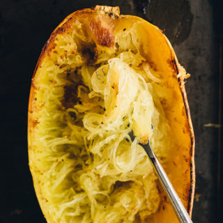 How to roast spaghetti squash. Caramelized and roasted spaghetti squash, raked and ready to be served with crockpot bolognese. An easy, gluten free pasta substitute!