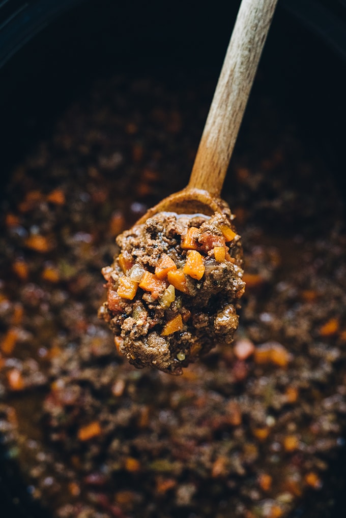 How to make crockpot bolognese, an easy, kid friendly weeknight dinner! Slow cooked bolognese sauce with grass fed ground beef, mirepoix, red wine, herbs, and cream.
