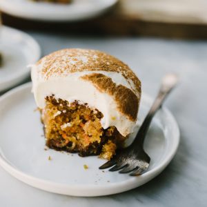 My mom's recipe for classic carrot cake is rich and incredibly moist, topped with gooey cream cheese frosting. It's the best recipe for carrot cake you'll ever make! #carrotcake #thanksgivingdessert #dessert #cake