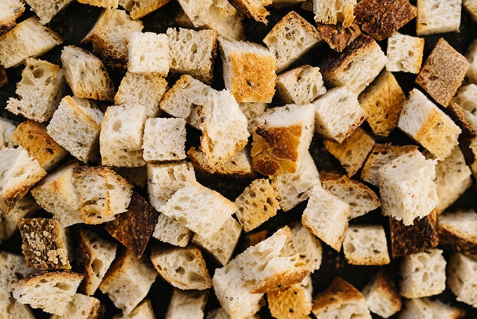 Golden brown rye bread croutons for sausage and cranberry stuffing. A savory and mildly sweet Thanksgiving side dish!