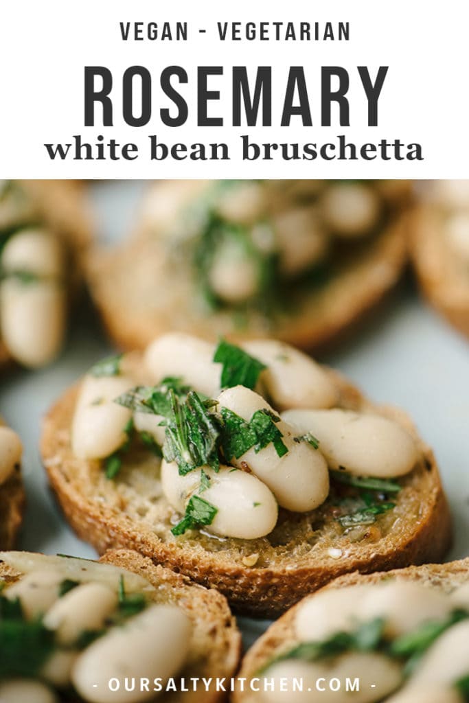 This recipe for rosemary marinated white bean bruschetta is the low-on-prep, high-on-taste appetizer of your cocktail party dreams. This recipe is vegan and vegetarian, incredibly easy, requires no fancy kitchen equipment, and needs just 15 minutes of prep. Who knew beans on toast could be so delicious?!?