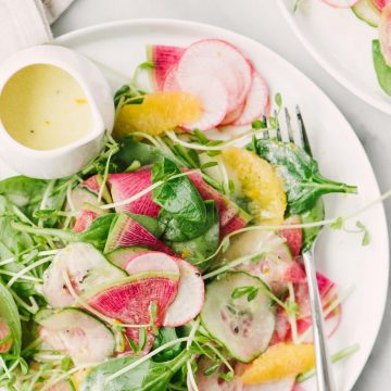 This watermelon radish salad with meyer lemon vinaigrette is the very best of winter produce. This winter salad recipe is vibrant, earthy, tangy and almost too pretty to eat. #vegetarian #winter #radish #watermelonradish #wintersalad #recipe