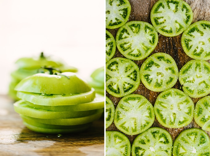 How to prep green tomatoes. Left, a stack of green tomato slices. Right, sliced of green tomatoes sprinkled with salt on a wood cutting board.