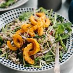 A vegetarian and gluten free delicata squash salad with creamy maple dressing.