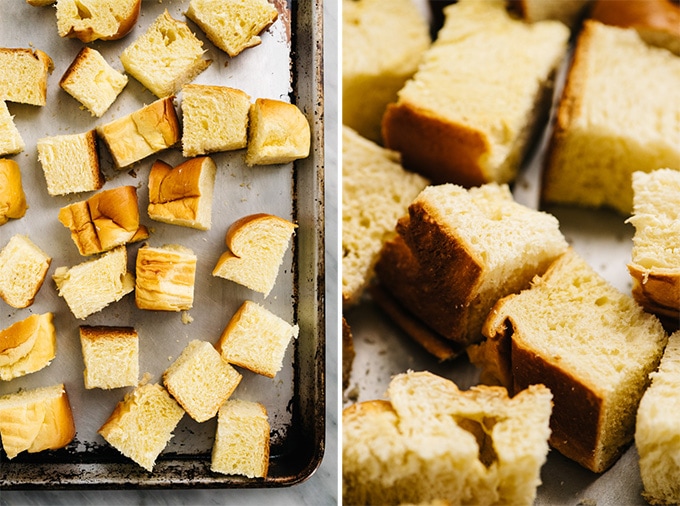 Cubes of brioche bread on a baking sheet before and after being dried in the oven.