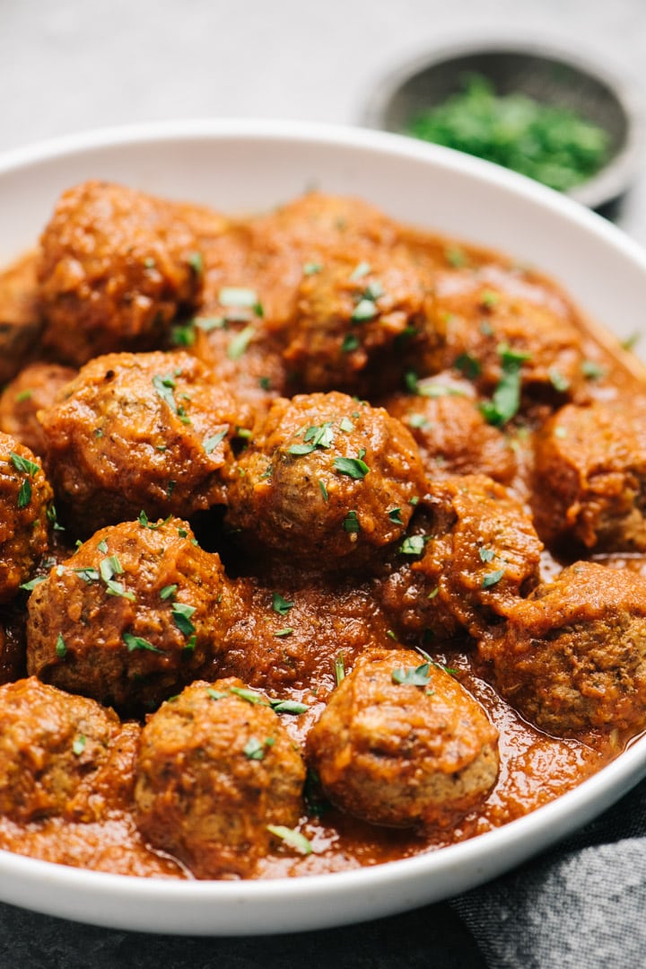 Meatballs and sauce in a white bowl