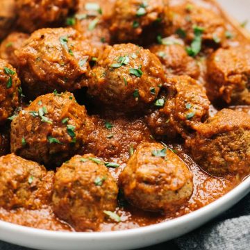 whole30 Italian meatballs served in sauce in a white bowl