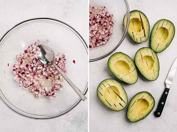 Red onions macerating in a bowl; avocados sliced in half and scored in a grid pattern.