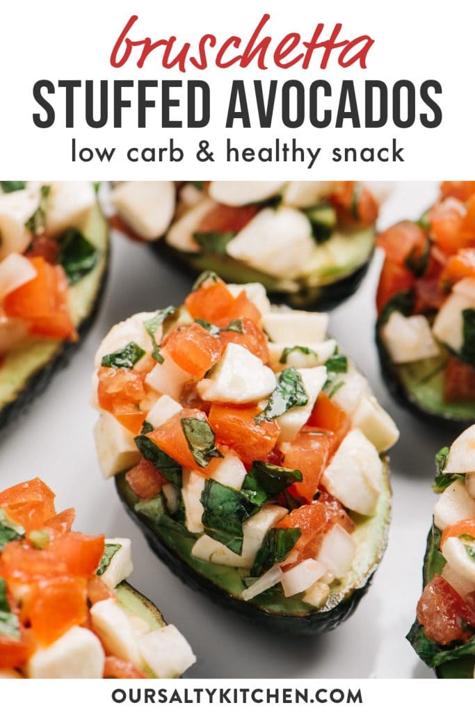 Pinterest image for stuffed avocados with tomato bruschetta.