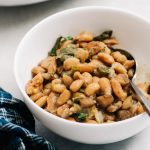 A small bowl of mexican style instant pot pinto beans.