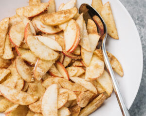 Thinly sliced apples tossed with flour, brown sugar, and spices.