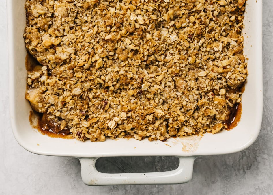 Gluten free apple crisp fresh from the oven in a casserole dish.