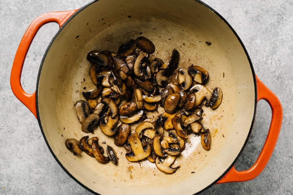 Sauteed mushrooms in a dutch oven.