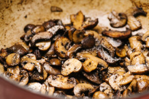 Sautéed mushrooms in a dutch oven.