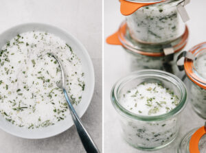 Rosemary salt in a white mixing bowl and packaged into small glass jars.