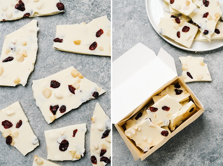 Left - several chunks of white chocolate bark spread across a concrete background; Right - chunks of chocolate bark tucked into a paper candy box.