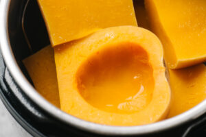 Cooked pieces of butternut squash in an instant pot.