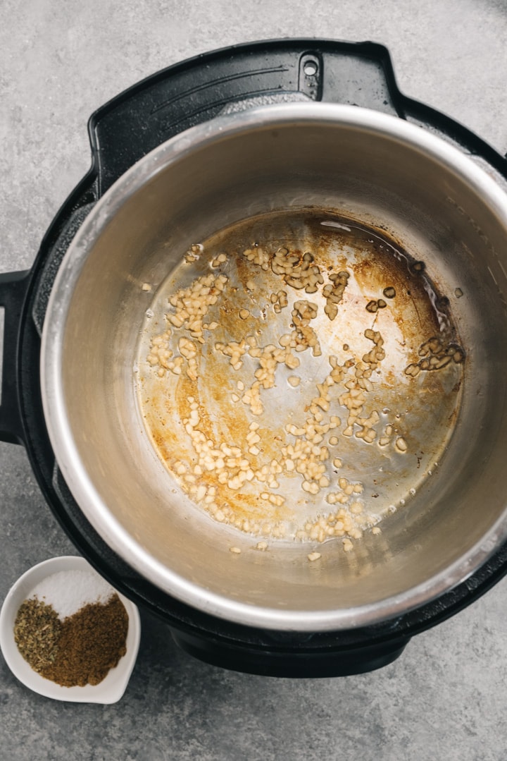 Sautéed minced garlic in an instant pot.
