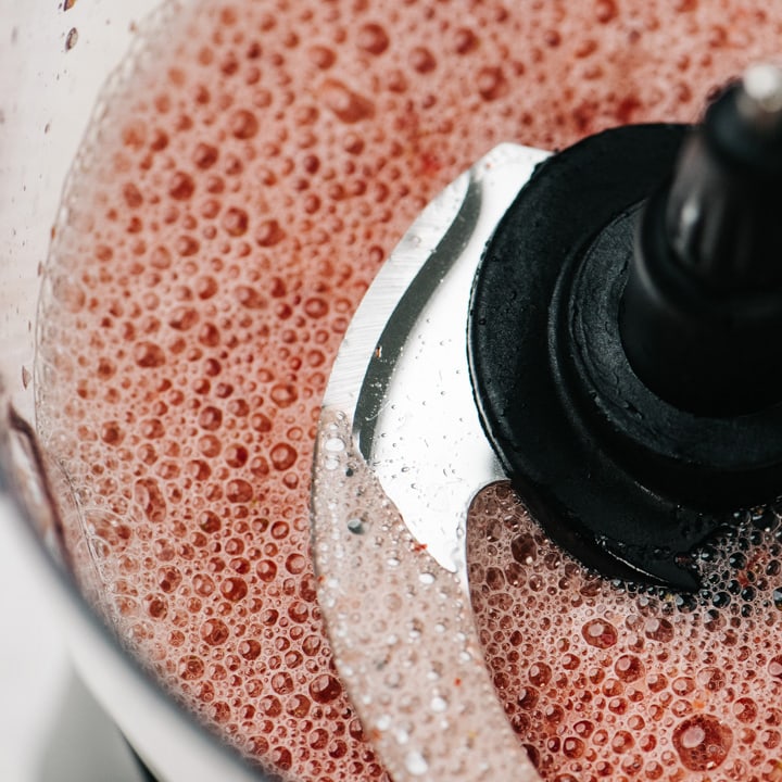 Strawberry puree in a blender.