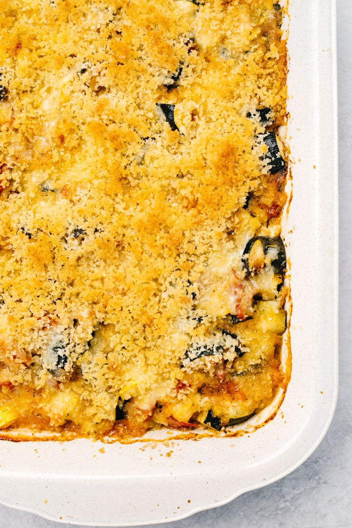 A golden brown baked zucchini casserole fresh from the oven.