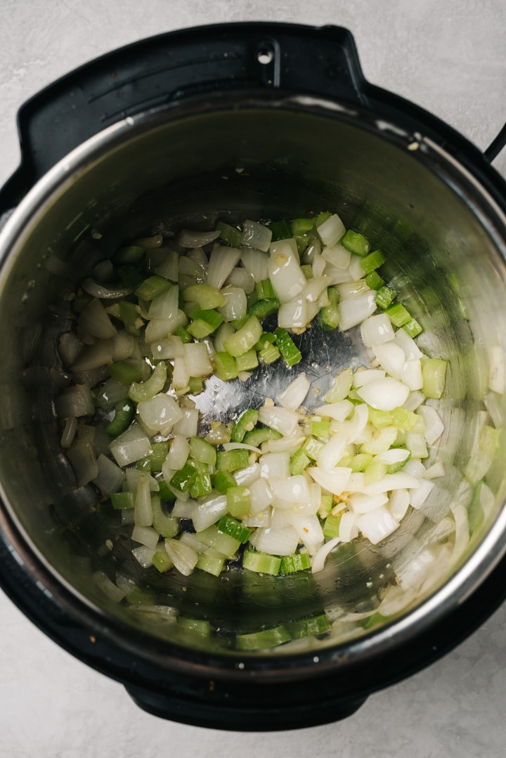 Sauteed onion, celery, and garlic in an instant pot.