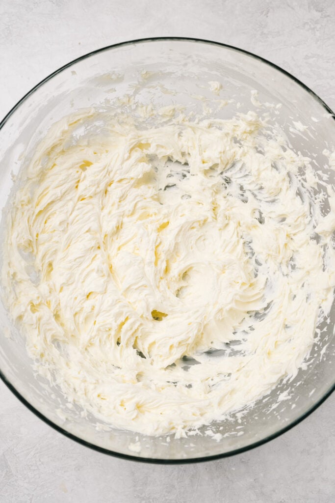 Butter and powdered sugar whipped until light and fluffy in a glass mixing bowl.