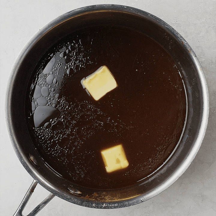 Red wine au just in a sauce pot with cold butter added.