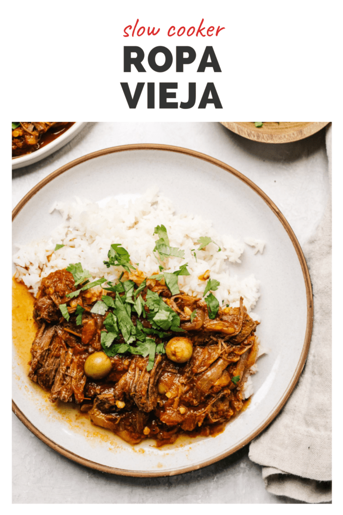 Pinterest image for a ropa vieja recipe made in a slow cooker.