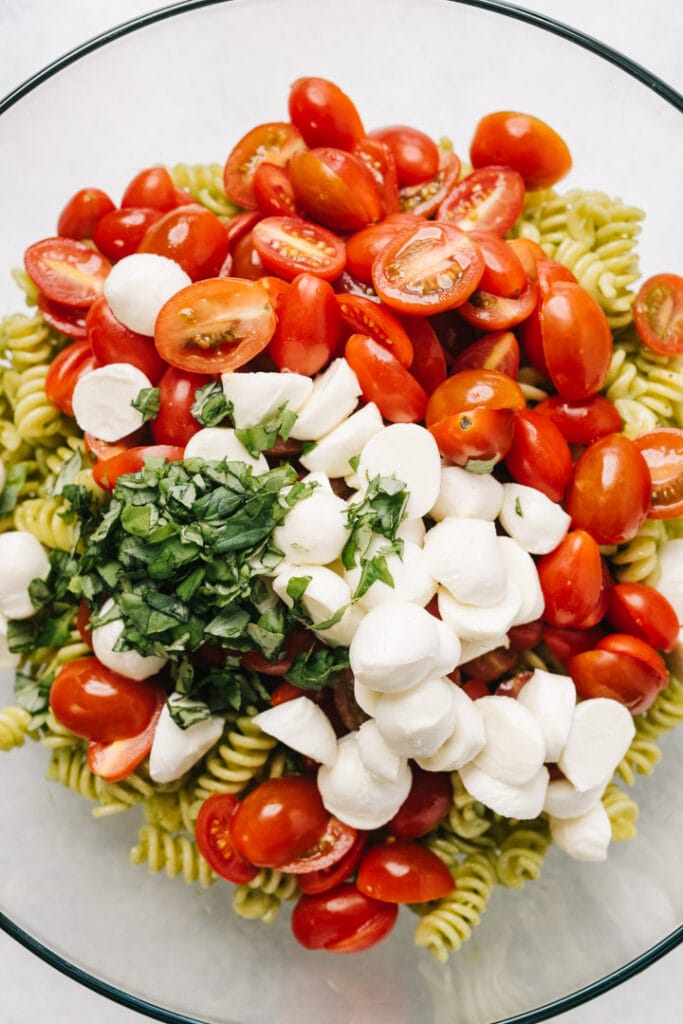 Pasta salad ingredients in a bowl. 