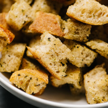 Homemade herb croutons in a bowl.