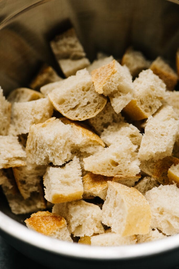 Cubed bread in a bowl. 