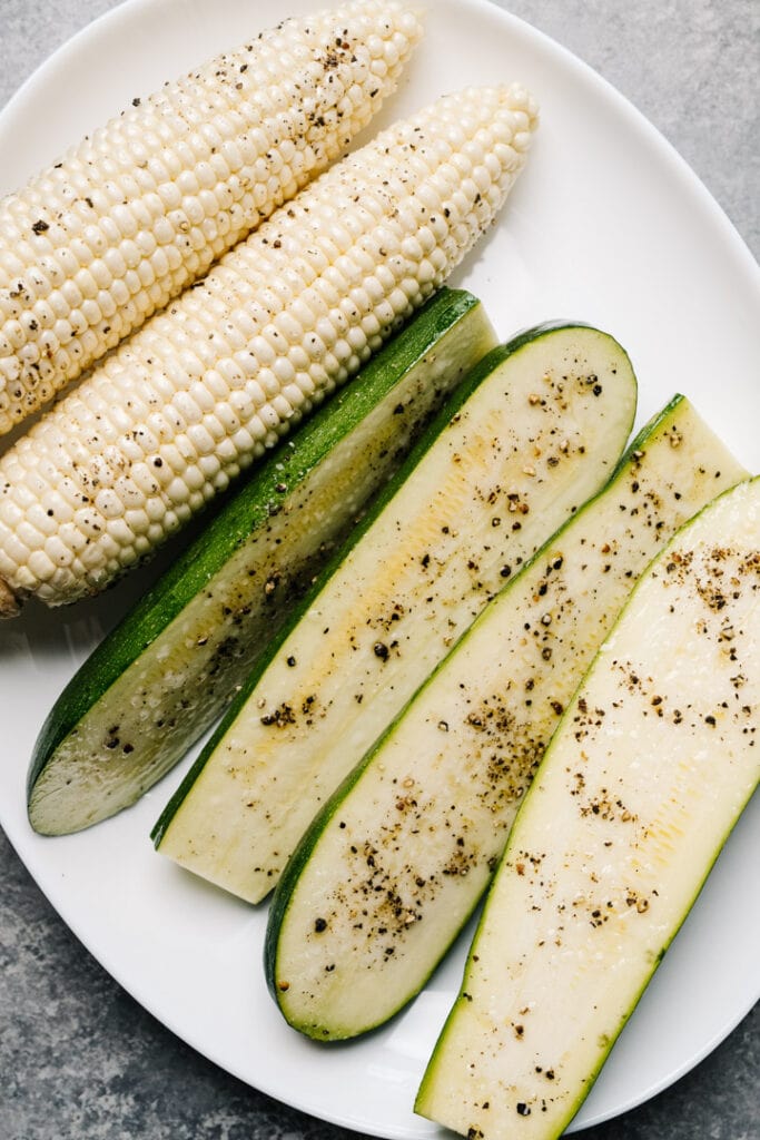 Grilling corn and zucchini for salad. 