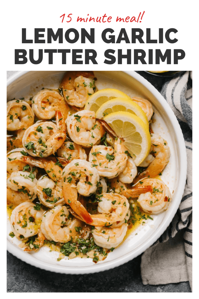 A bowl of cooked shrimp with a banner on top that reads 15 minute meal lemon garlic butter shrimp