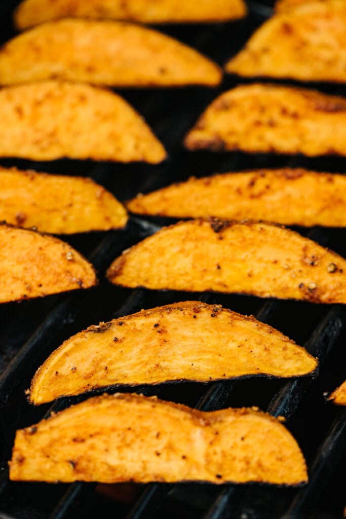 Sweet potato wedges grilling. 