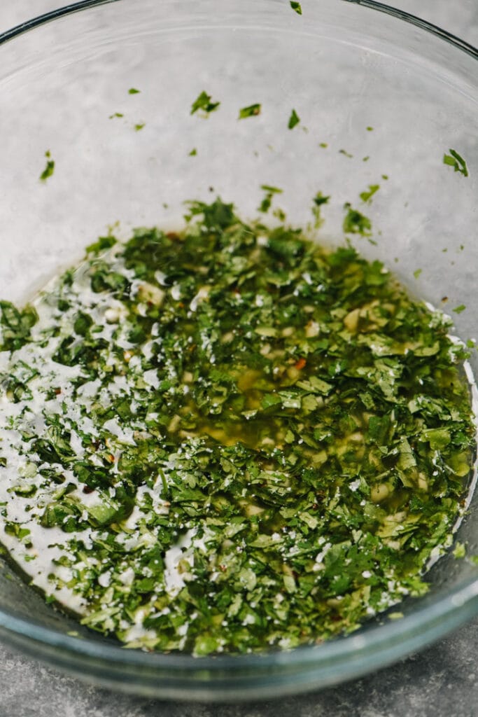 Cilantro lime marinade in a glass mixing bowl.