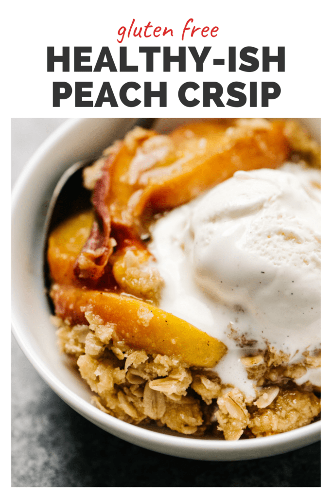 Peach crisp topped with vanilla ice cream in a bowl with a top banner that reads gluten-free healthy-ish peach crisp.