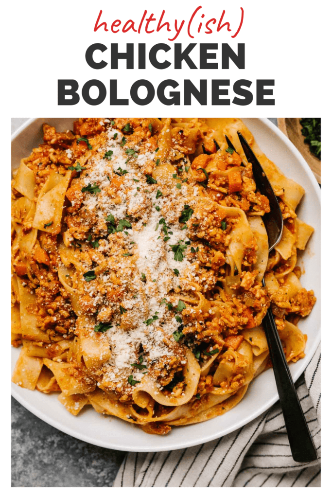 A plate with chicken bolognese and a fork, with a top banner that reads healthy-ish chicken bolognese.