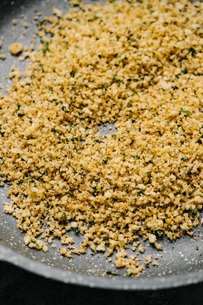 Toasted parmesan bread crumbs with butter, garlic, and fresh herbs.