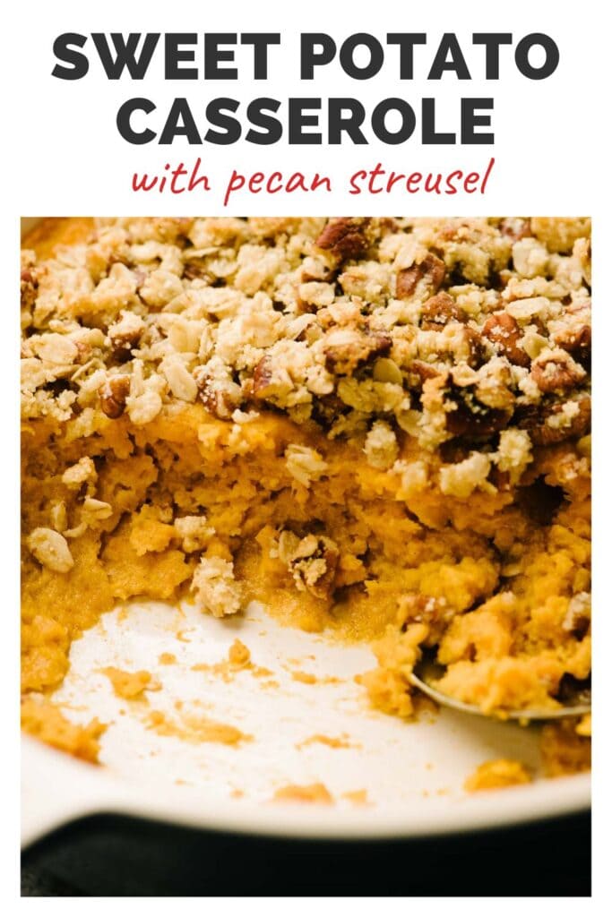 A baking dish of sweet potato casserole with some scooped out showing mashed sweet potatoes topped with pecans, and a top banner that reads sweet potato casserole with pecan streusel.