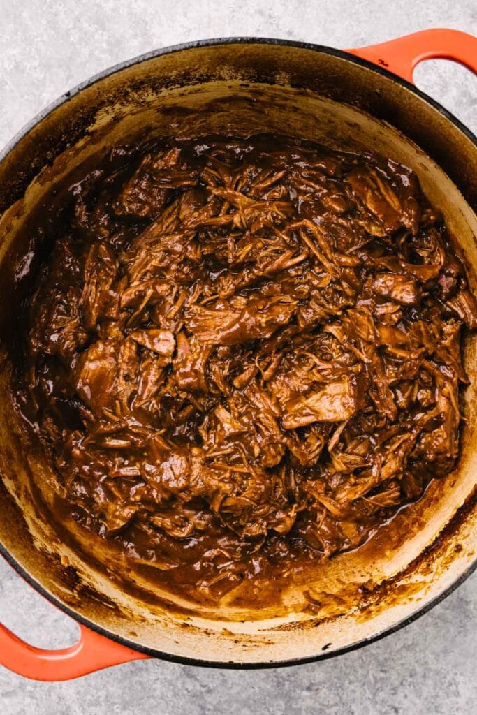 Mexican shredded beef in a dutch oven.