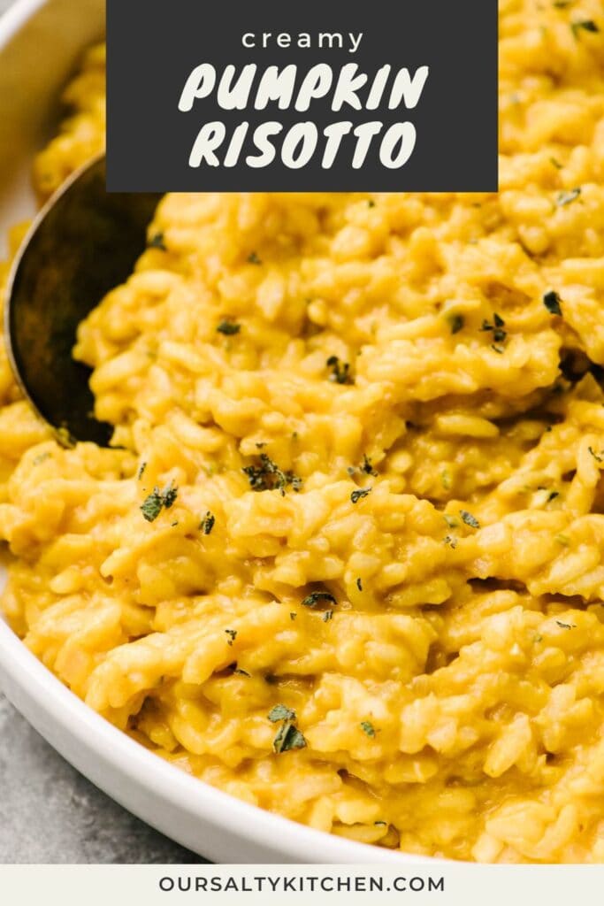 Side view, a close up image of a serving spoon tucked into a white serving bowl of pumpkin risotto, garnished with fresh chopped sage; title bar at the top reads "creamy pumpkin risotto".