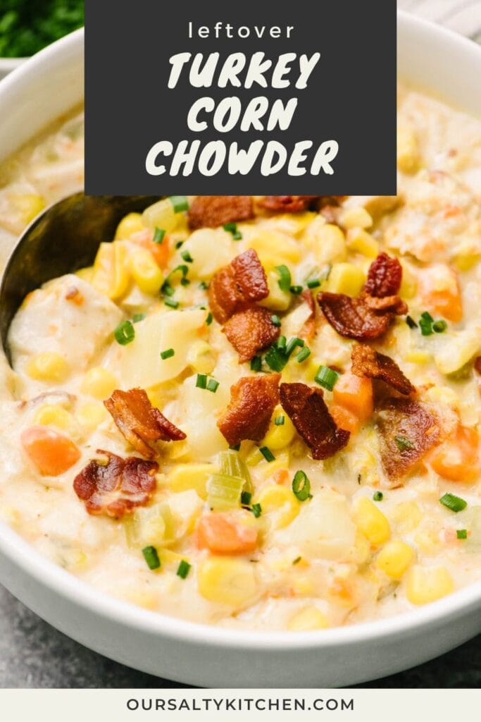 Side view, a spoon tucked into a bowl of leftover turkey corn chowder garnished with bacon and chives; title bar at the top reads "leftover turkey corn chowder".